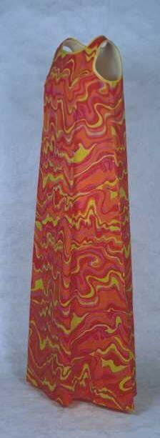 Enkellange gerende mouwloze maxi-jurk van vlieseline met grillig dessin in roze, rood, oranje en…