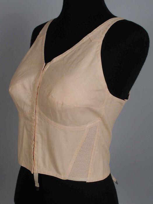 Roze katoenen bustehouder met schouderbandjes, elastische borstinetten, haakjessluiting aan de…