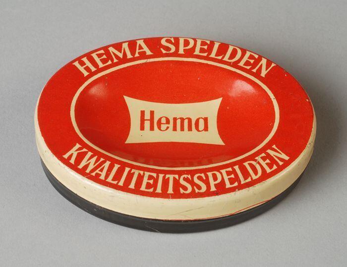 Ovaal rood, wit en zwart blik, "HEMA SPELDEN"