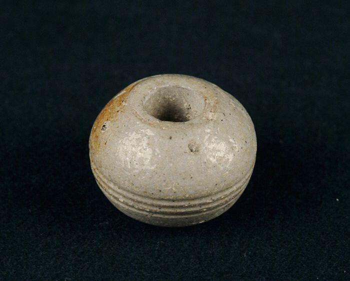 Grijze spinklos met rond midden ringen