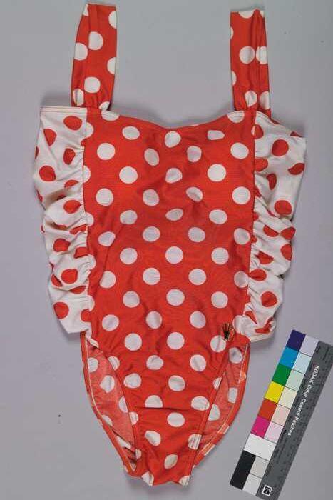 Rood badpak met witte noppen, flanken wit met rode noppen