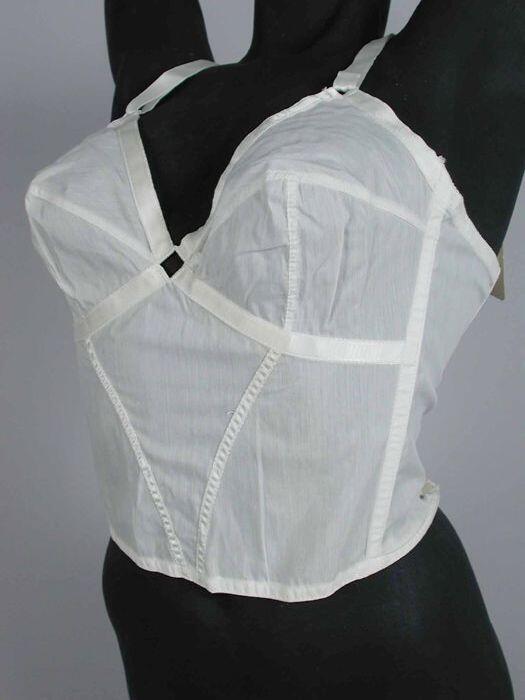 Witte doorschijnende bustier, cups afgebiesd met satijn, vierkant gaatje in midden, satijnen…