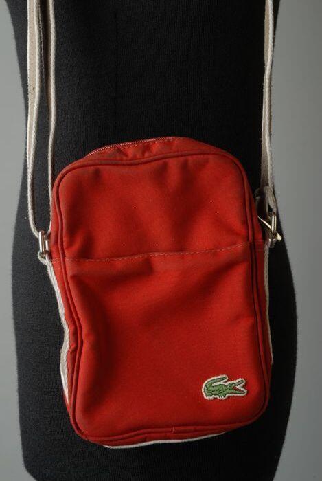 Rood Lacoste tasje met bruin/witte schouderband