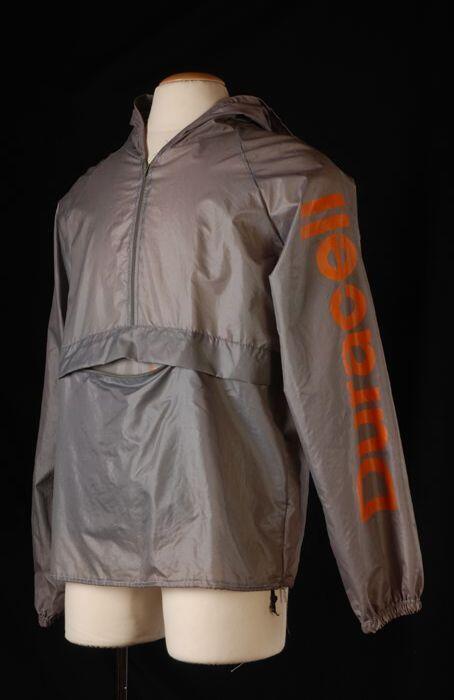 Grijze herenanorak met capuchon met oranje opdruk "DURACELL"