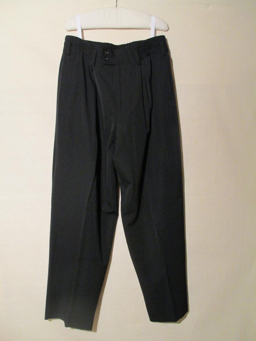 Broek (man) van zwarte wol, behorende tot ensemble