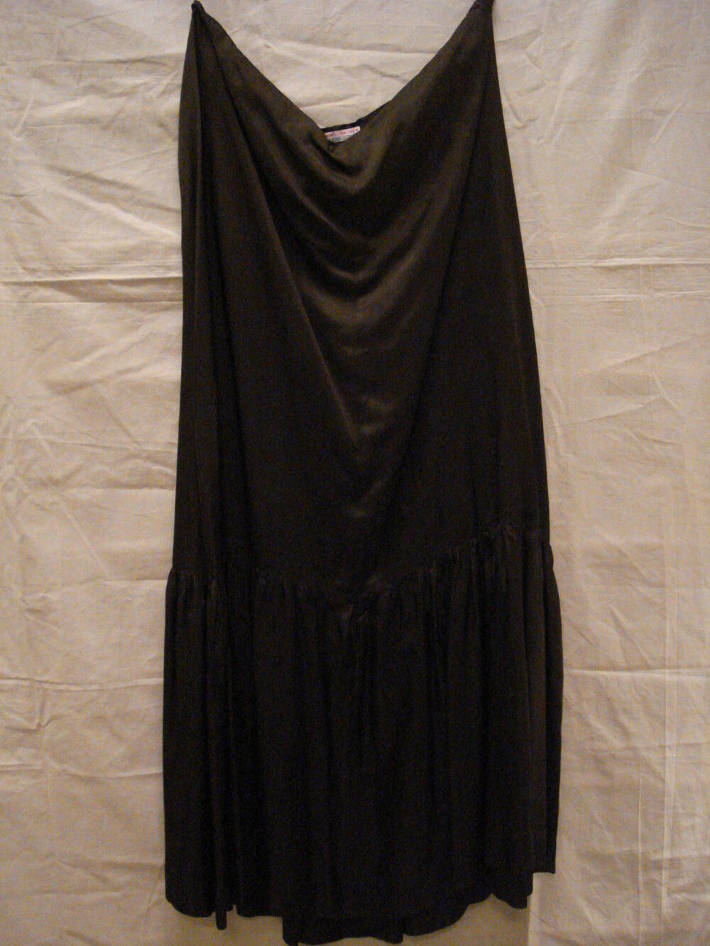 Rok, lang model met lange geplooide strook van donkerbruin glanzend rayon