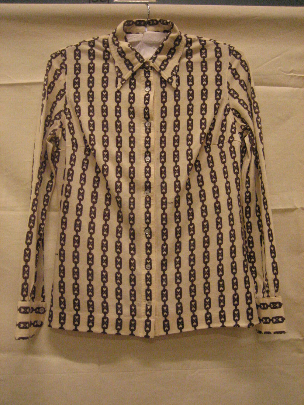 Blouse van wollen tricot, crèmekleurig fond met print van schakelketting in bruin