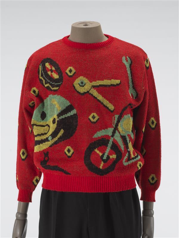 Trui, Fiorucci rood, met ingeweven motieven motorfiets, helm en gereedschap in geel en groen