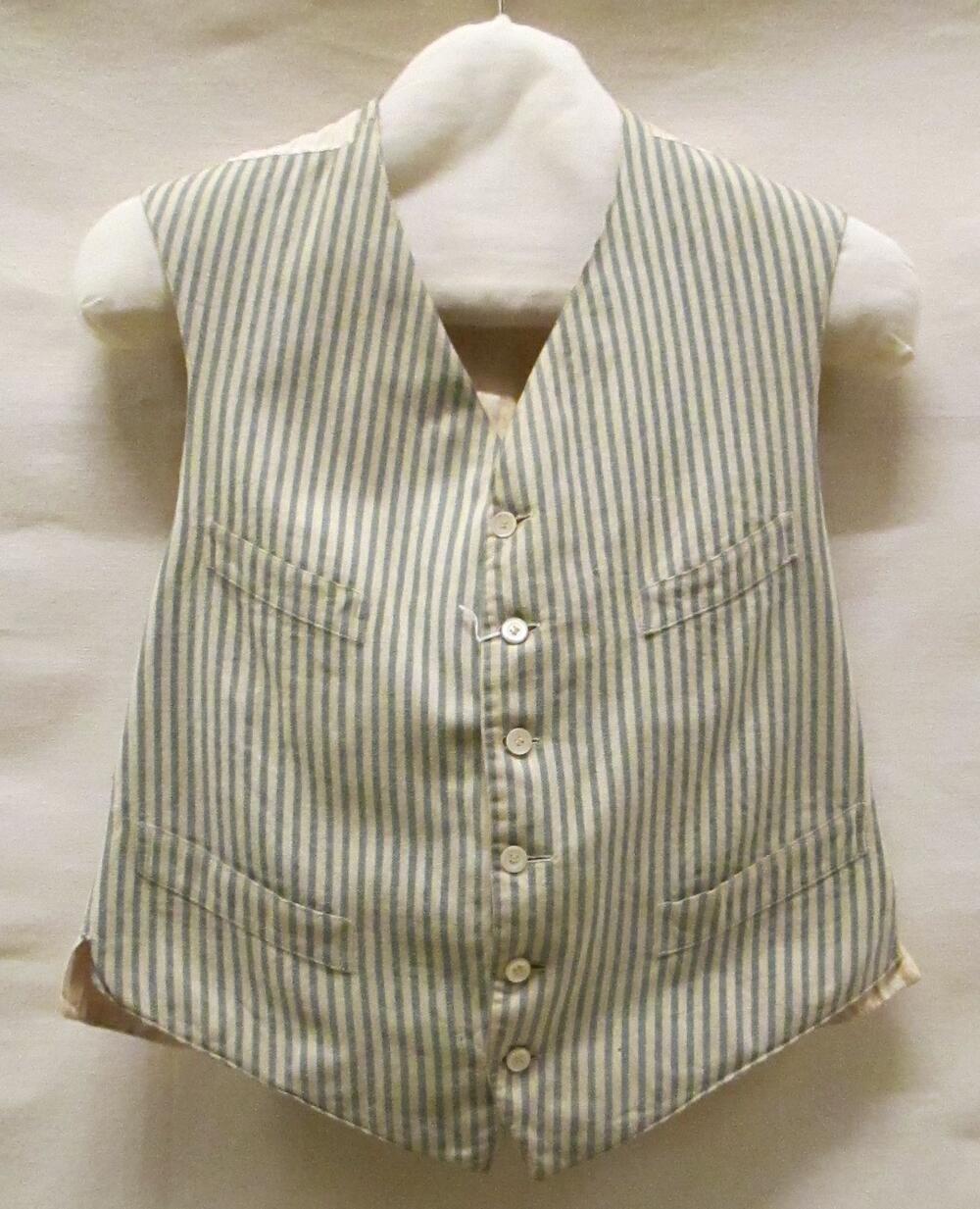 Vest (man) van wal met een blauw/witte streep, achterpand van cremekleurige zijde en een voering…