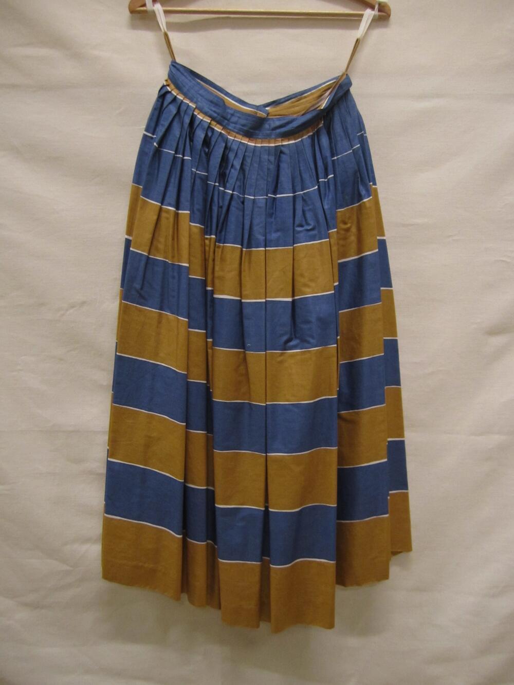 Rok van wit glans katoen met horizontale streep in blauw en oker met smalle witte uitsparing…