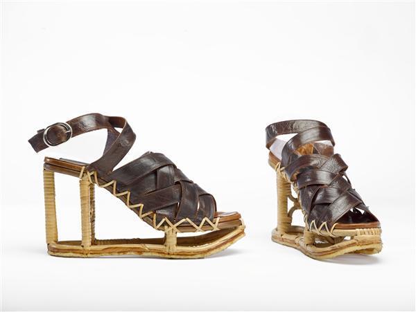 Vrouwensandalen met rotan onderstel en gevlochten leren banden