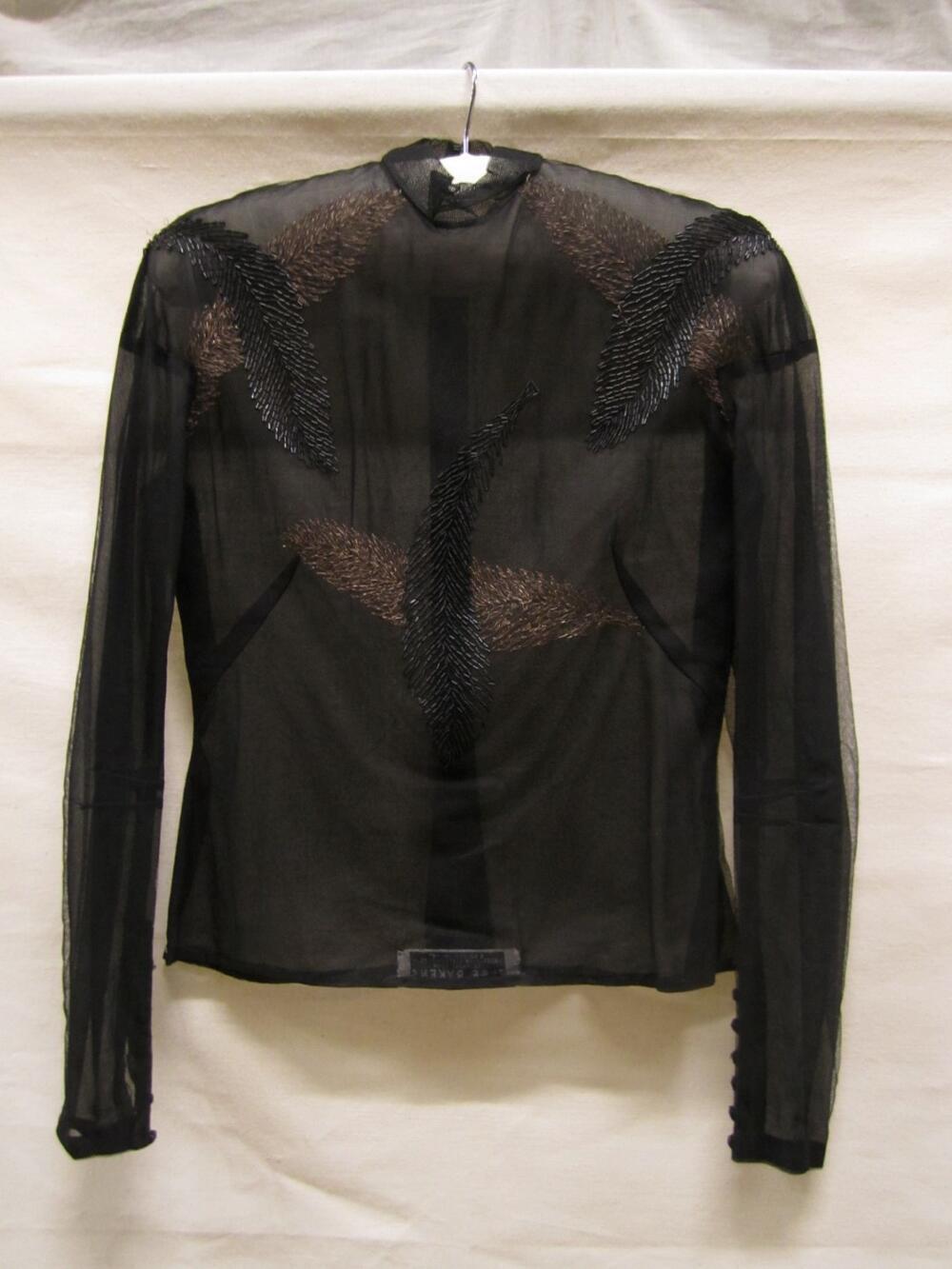 Avondblouse van zwarte tule bestikt met bladermotieven in gouddraad en zwarte staafkralen