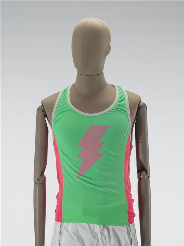 Hemd, roze/groene kunststof met lichtgrijze bies en opdruk van roze bliksemschicht
