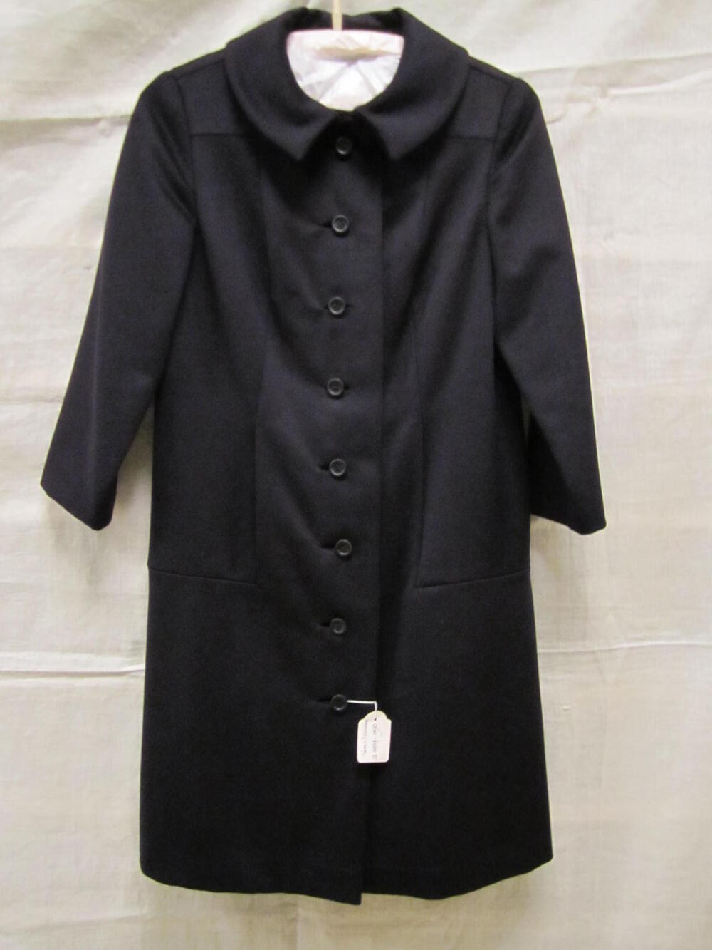 Jas van donkerblauw laken, halflang model