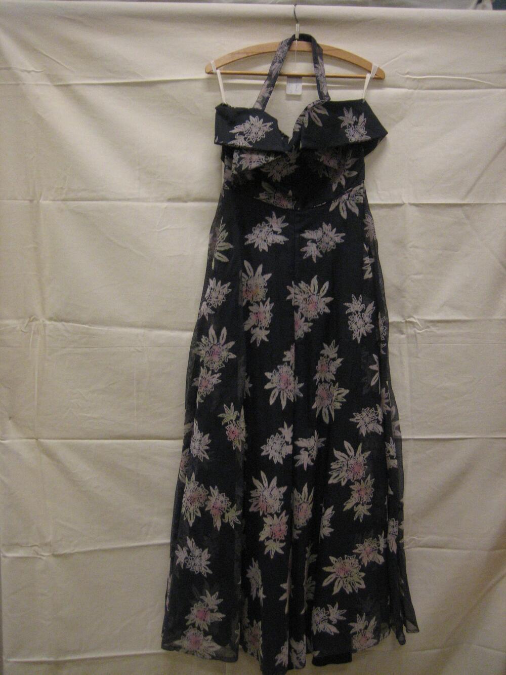 Avondjurk van donkerblauw gaas (synthetisch) met bloemdessin van flockprint in geelgroen en roze
