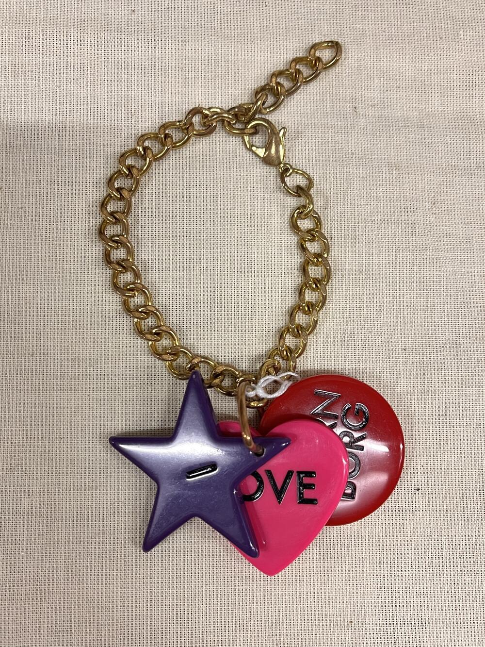 Armband, goudkleurig, schakels met kunststofbedels in de vorm van ster/hart/rondje