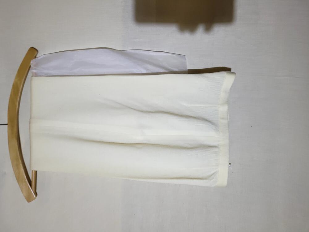 Pantalon van machinaal gebreid wit wollen tricot