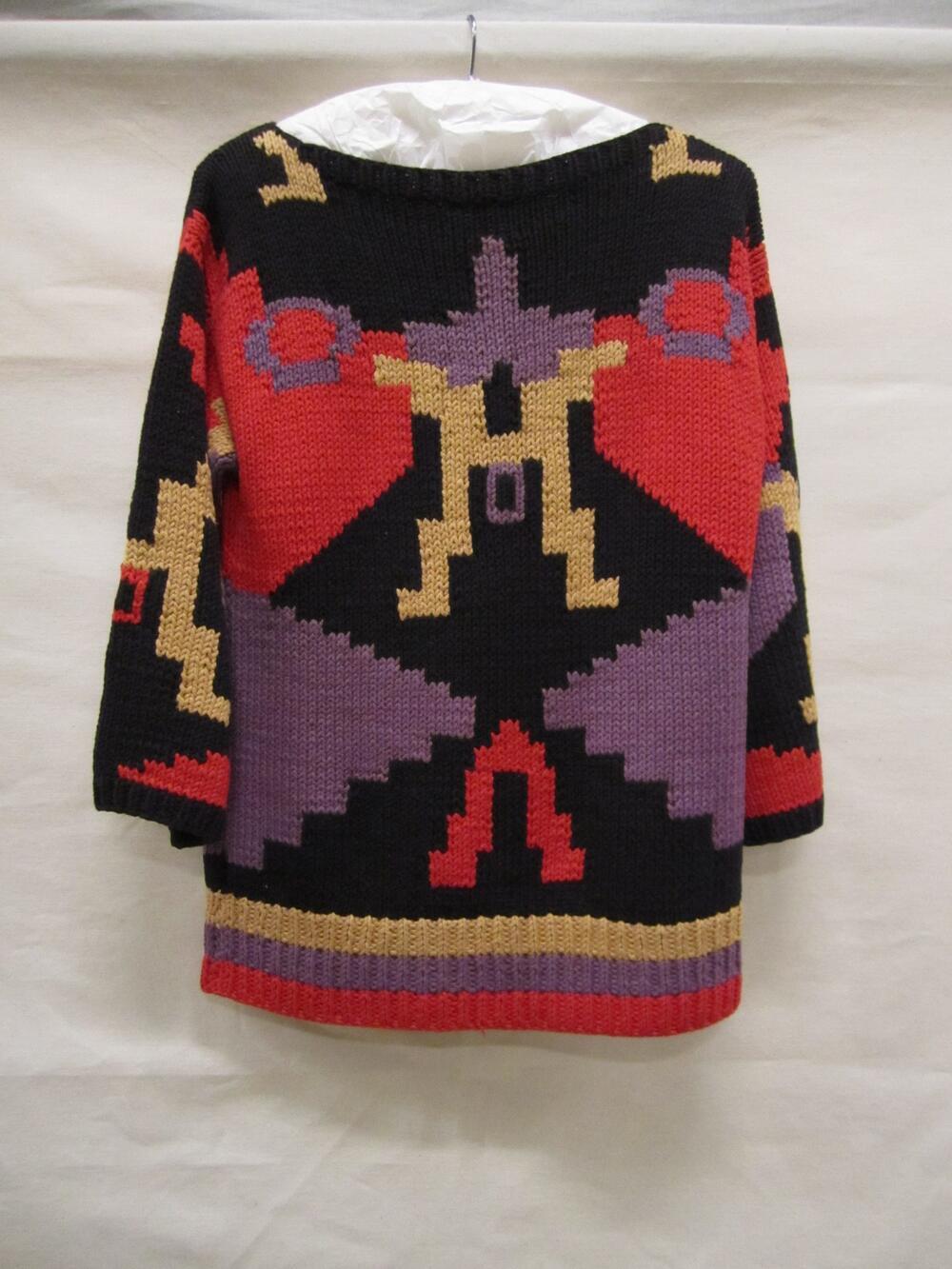 Trui van zwart katoen met ingebreid geometrisch Art Deco-motief in rood, lila en geel