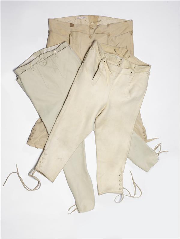 Kuitbroek (man) van beige/geel katoen met dubbele klep