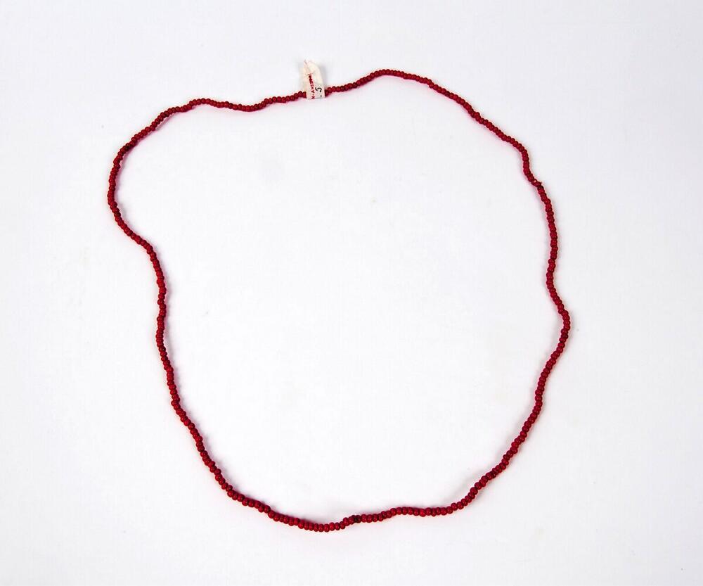 Kralenketting die gewijd is aan de Afro-Braziliaanse godheid Ogum