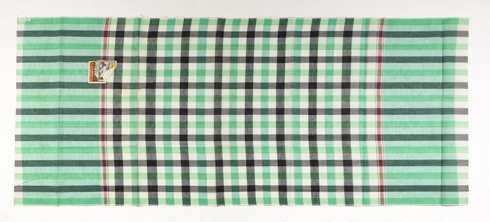 Een katoenen doek gebruikt door mannen voor verschillende doeleinden.