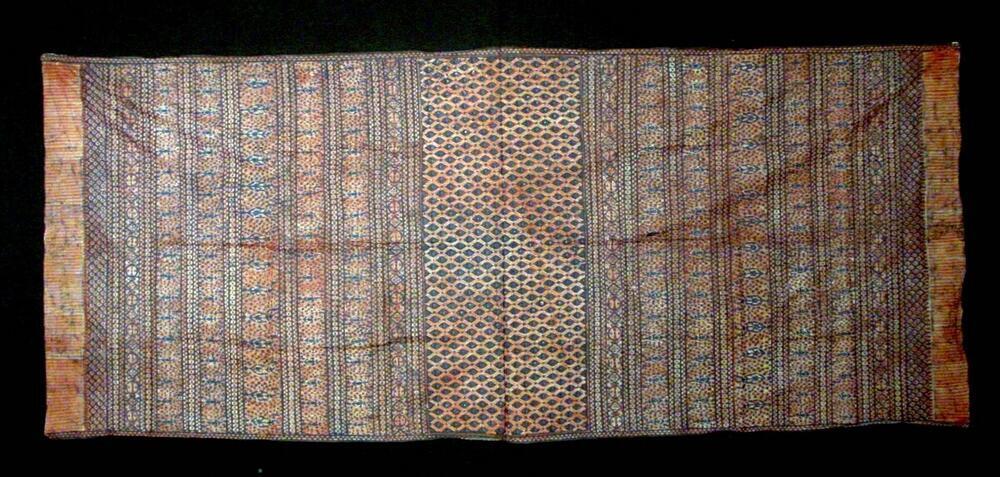 Schouderdoek, versierd met stempelbatik