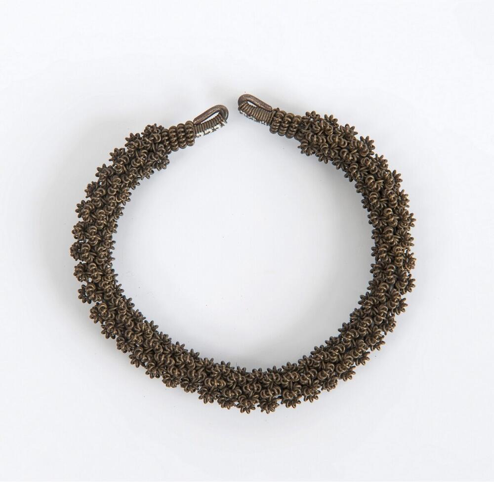 Armband van ijzer en koperdraad
