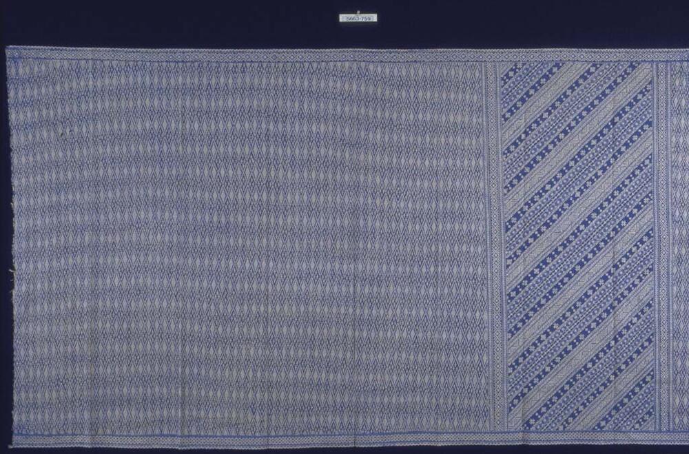 Kokerrok met blauwe geometrische patronen en banen