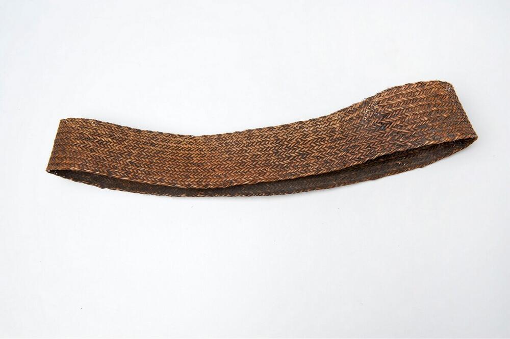Buikband van gevlochten rotan