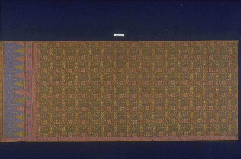 Wikkelrok door (Arabische naam), met geometrische patronen