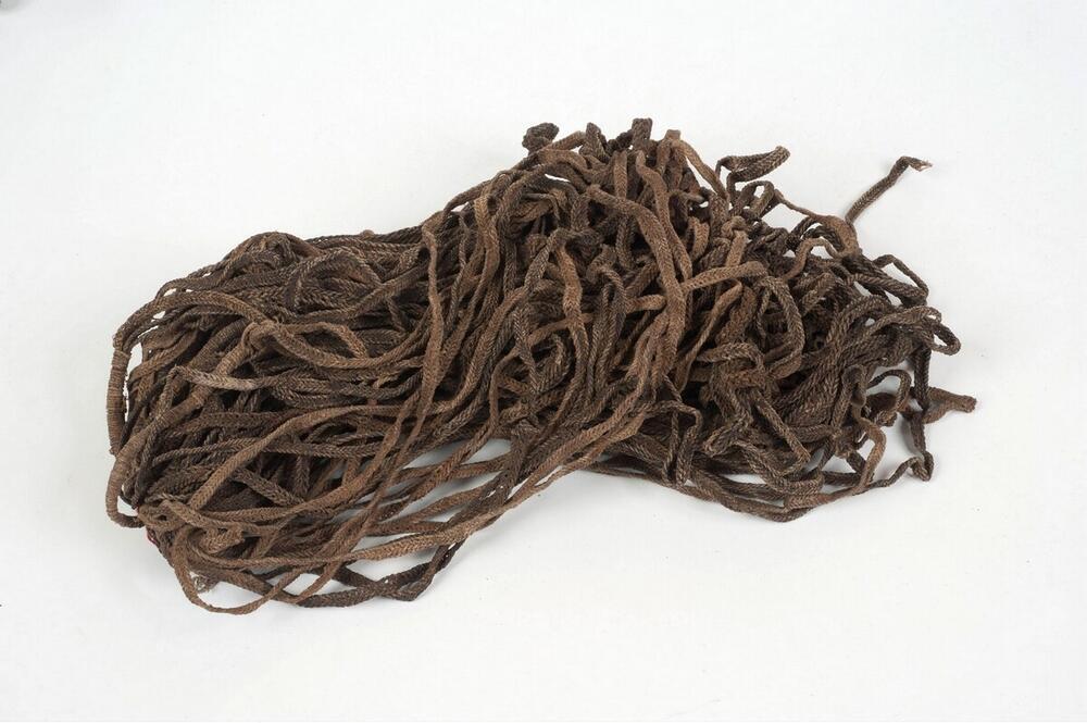 Bundle of twenty girdle bands, used by boys in the young men's house