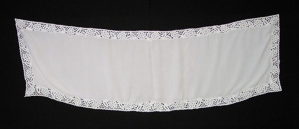Head scarf, part of a costume for a Muslim woman who has made the pilgrimage to Mecca