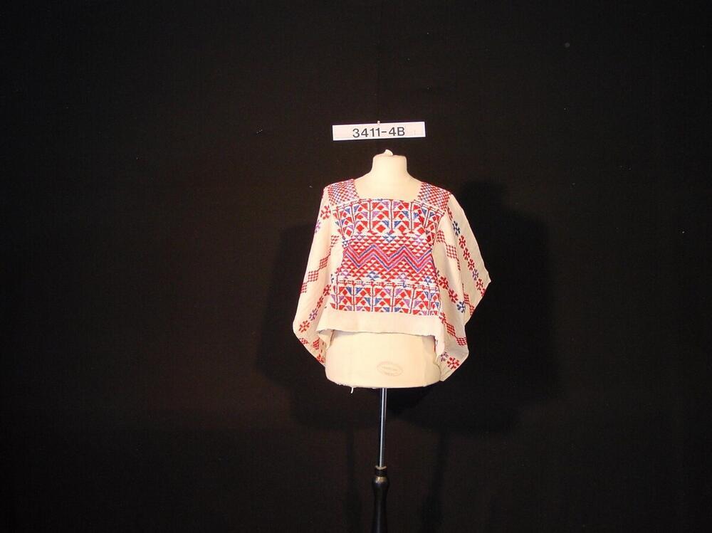 Veelkleurige vrouwenblouse met ingeweven motieven