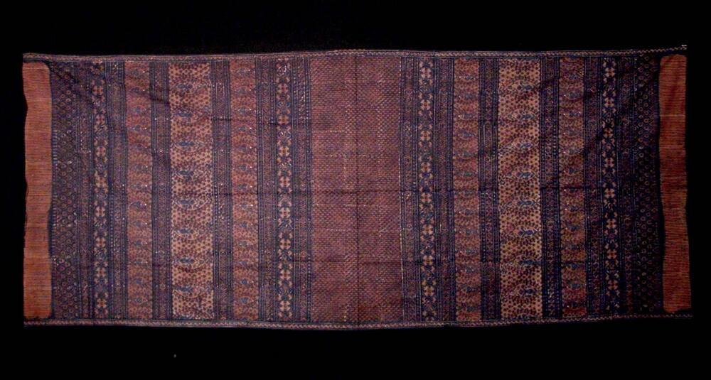 Schouderdoek, versierd met stempelbatik