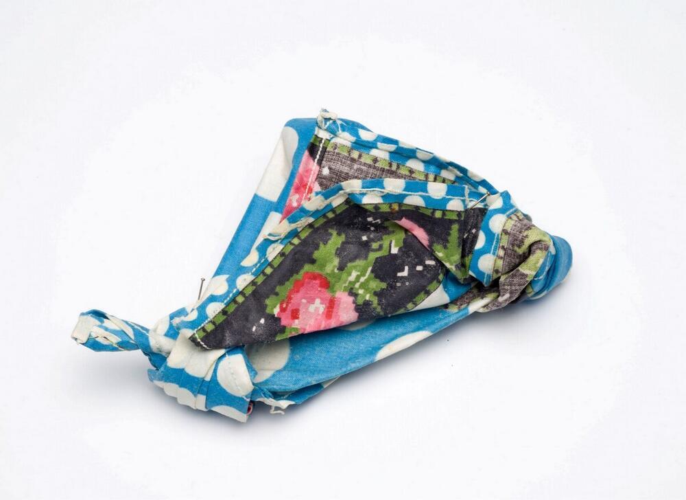 Model van een Surinaams-Creoolse hoofddoek