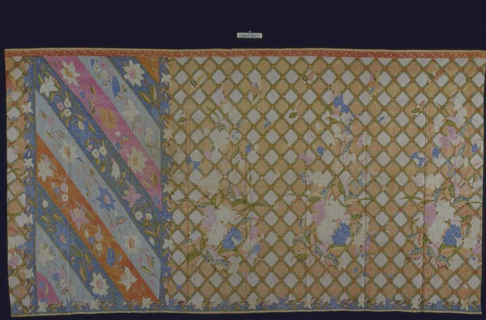 Kokerrok met veelkleurige banen met bloemen en geometrische motieven