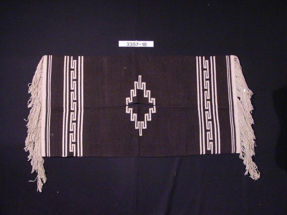 Wollen poncho met geometrische motieven en lange franjes
