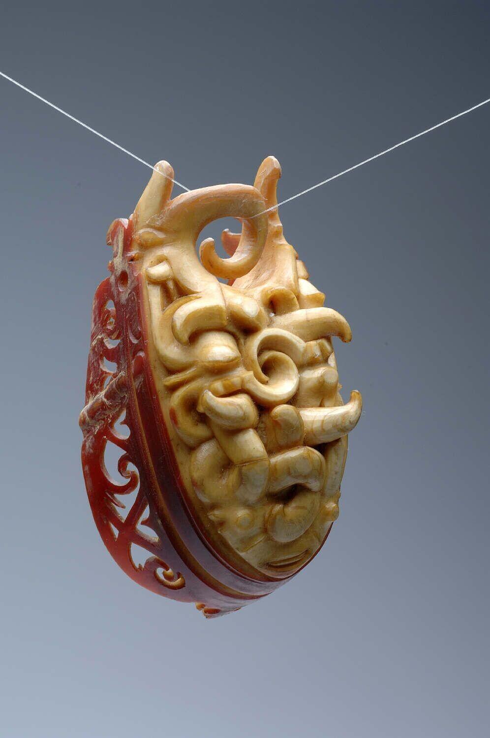 Earring made from the beak of a helmeted hornbill (Rhinoplax vigil)