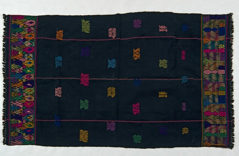 Donkerblauwe omslagdoek met plantenmotieven
