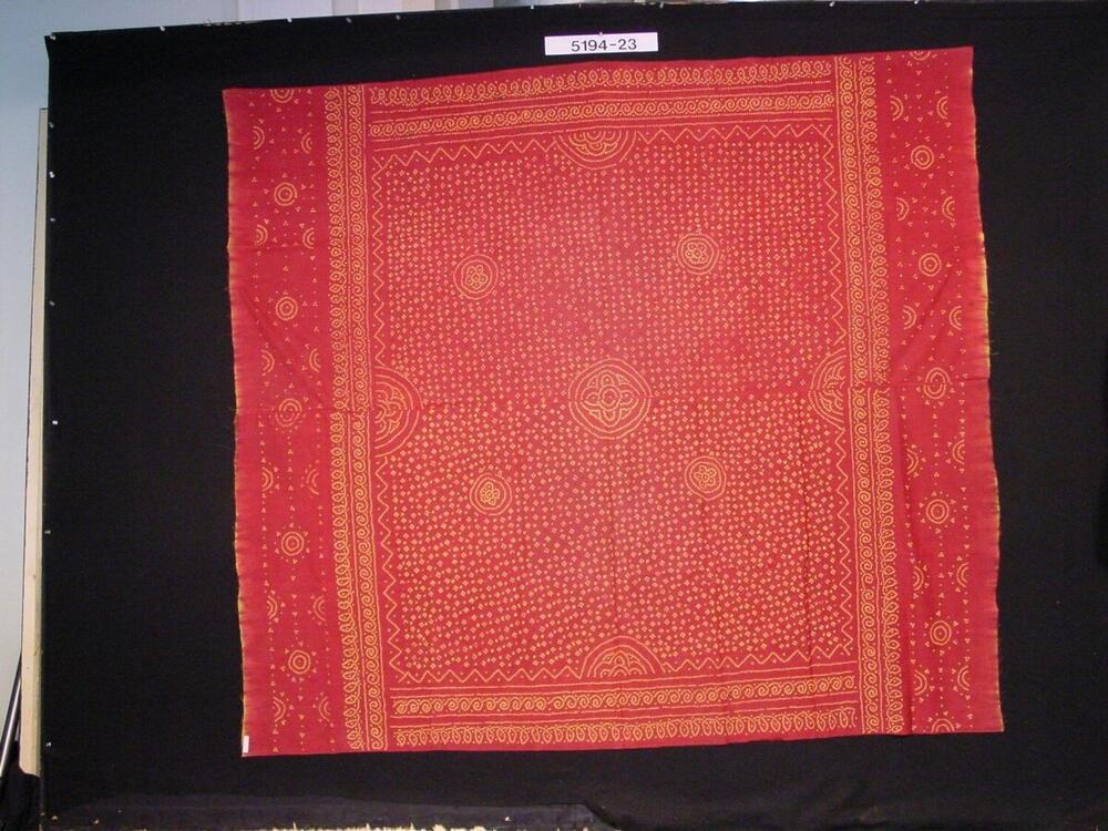 Omslagdoek met ornamenten gevormd met stippen