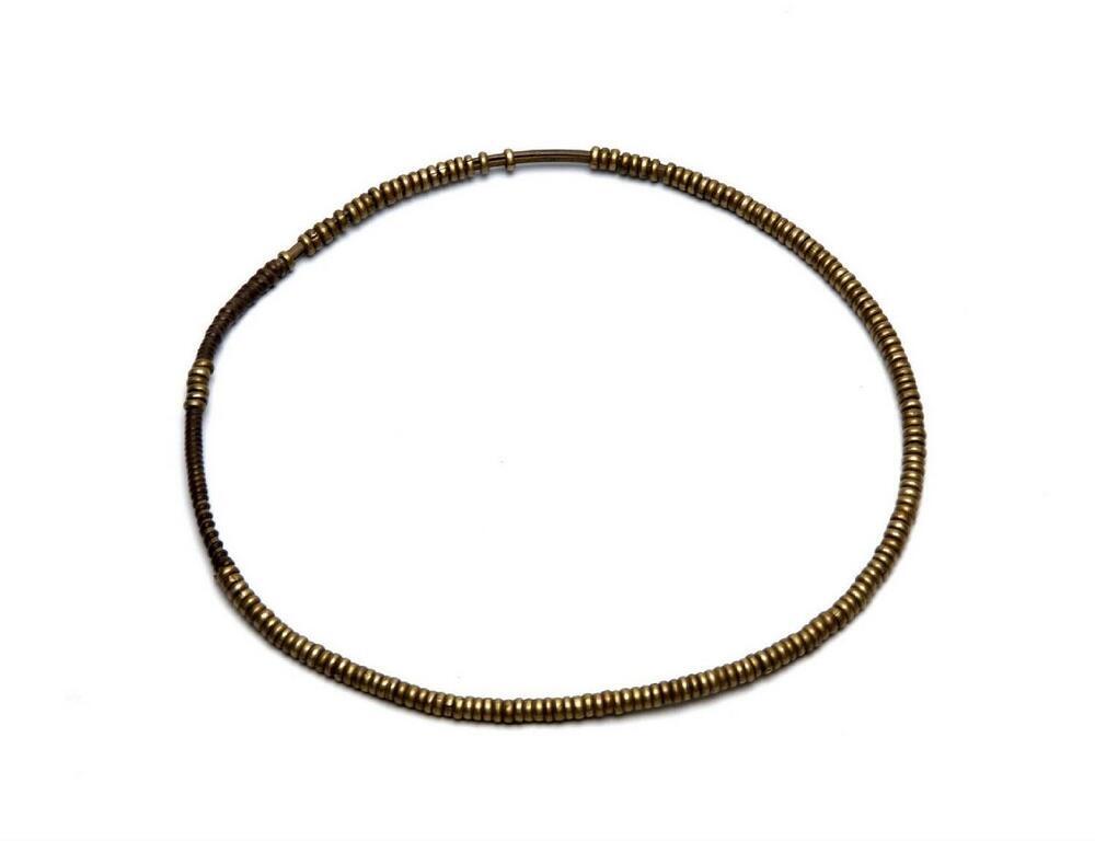 Rotan beenband met koperen ringetjes