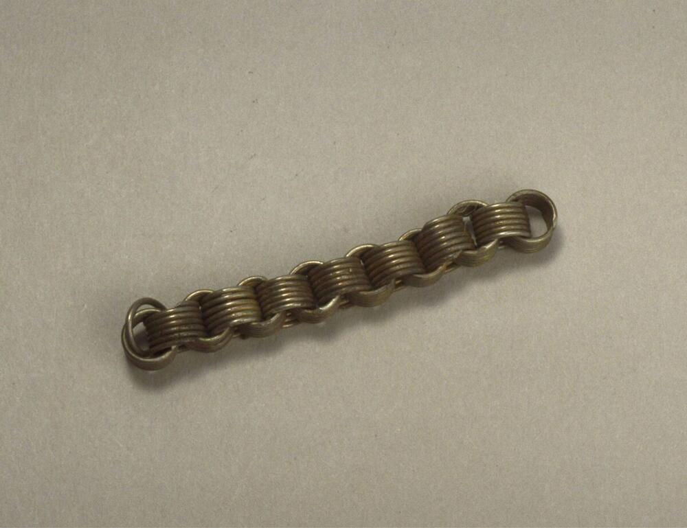 Zilveren hanger, gemaakt van schakelketting fragment