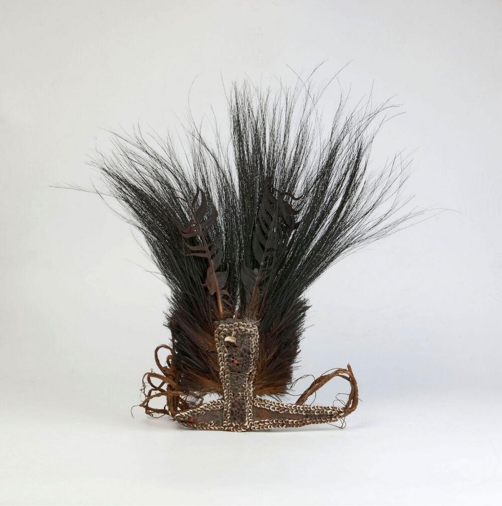 Head ornament with cassowary feathers