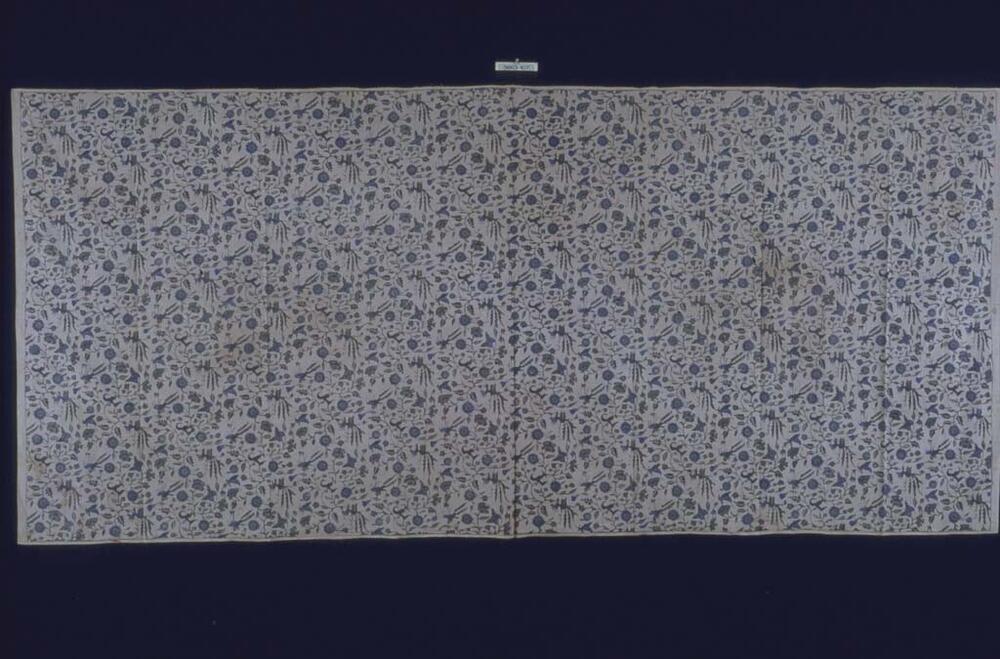 Wikkelrok met bloemen, vogels en vlinders in blauw-wit