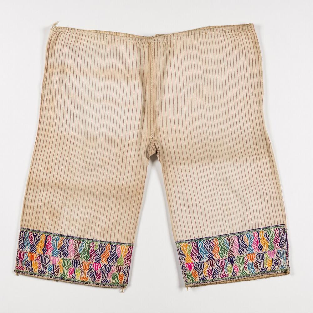 Witte broek met vogel- en plantmotieven