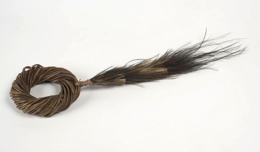 Bracelet, decorated with feathers
