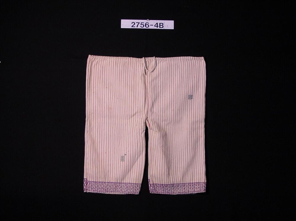 Katoenen broek met driekwart lange pijpen, onderdeel van een mannenkostuum