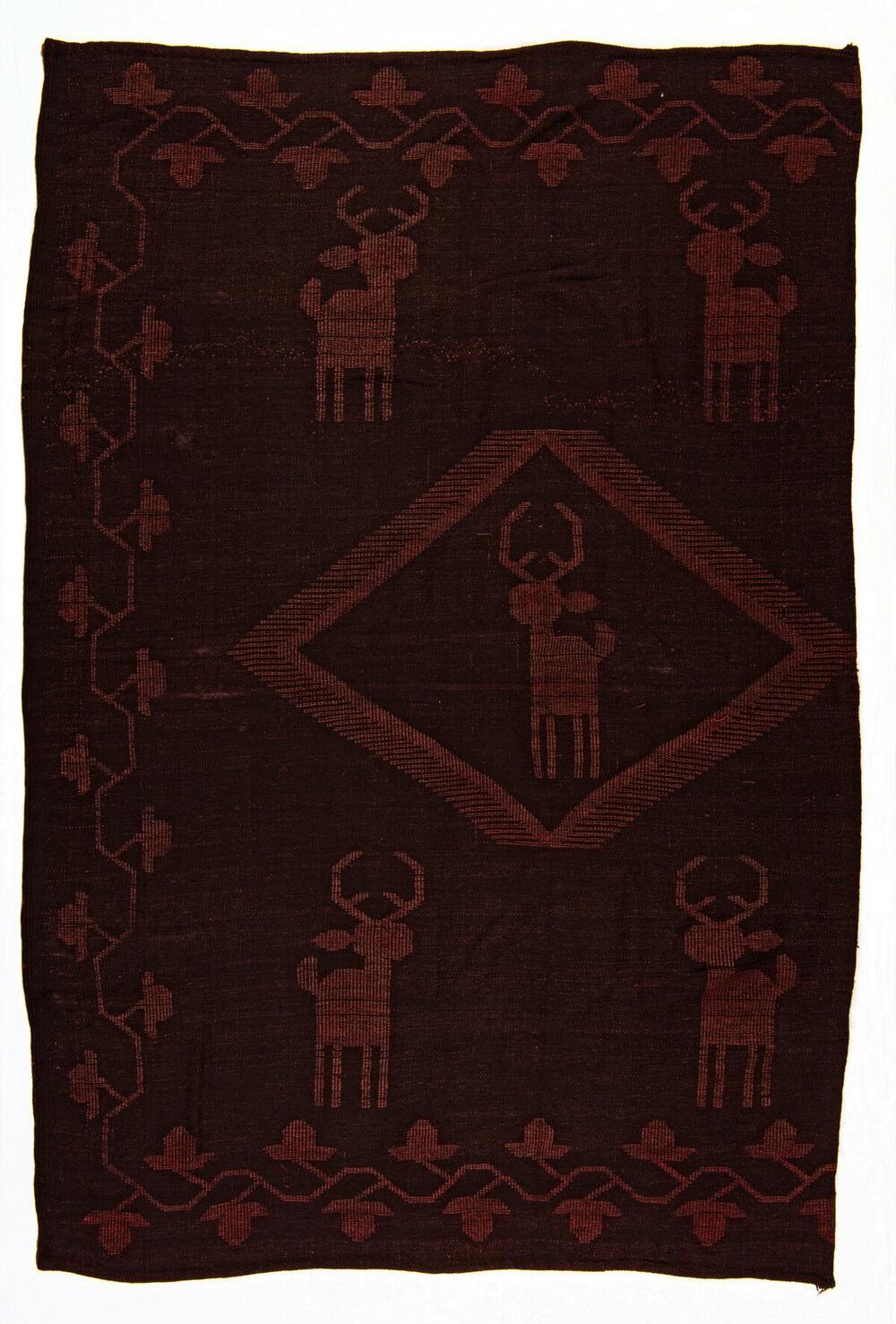 Bordeauxrode poncho met motieven van herten