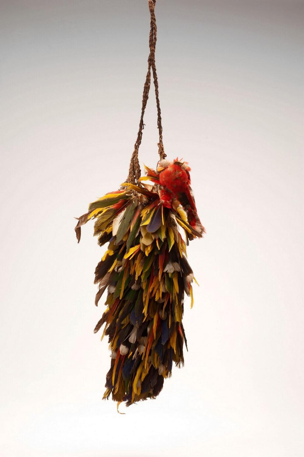 Back adornment of colored feathers