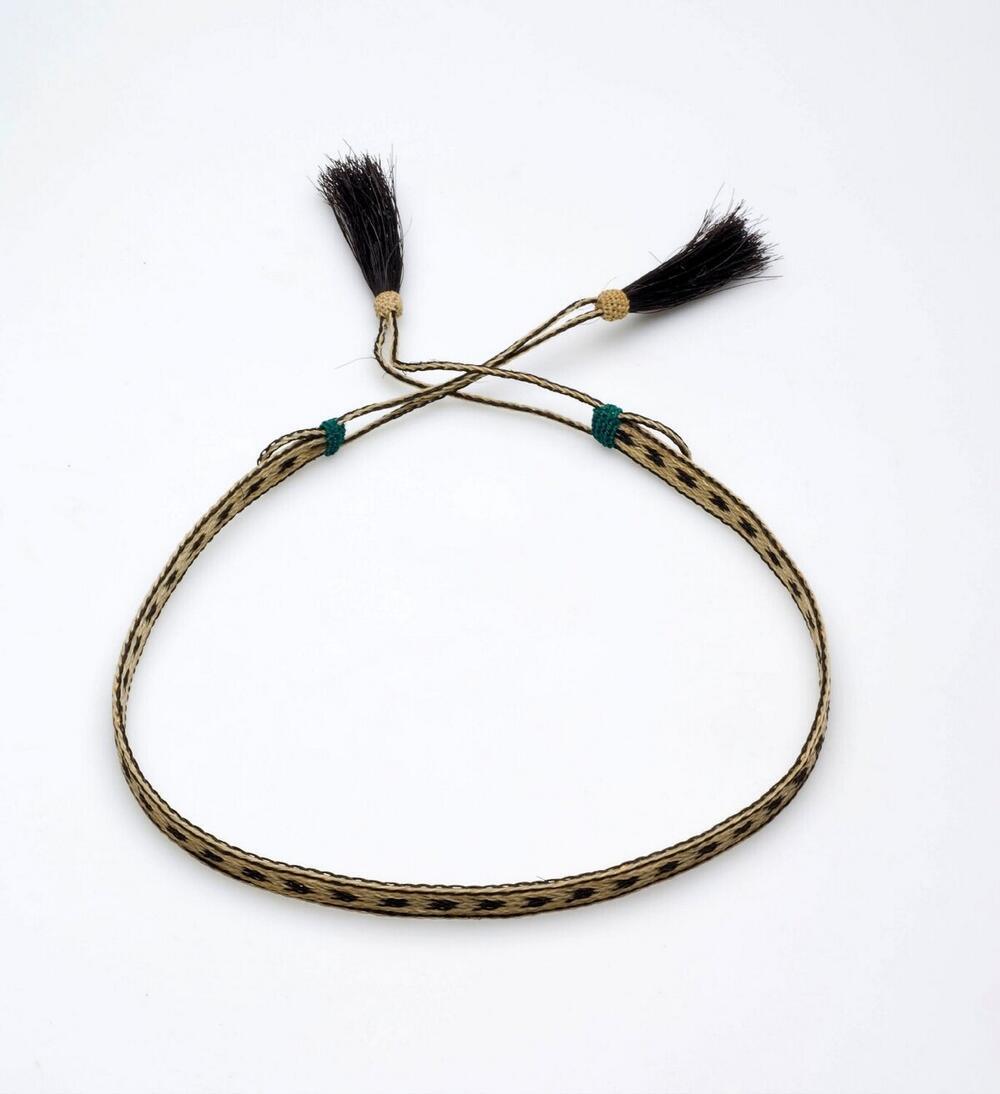 Hoofdband van sisal en geplastificeerd garen, voor de toeristenmarkt